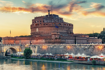 Fototapeta premium View on Castel St. Angelo in Rome, Italy, at sunset. Scenic travel background.