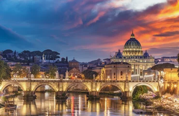 Fototapete View on the Vatican in Rome, Italy, at sunset with dramatic sky. Scenic travel background. © Funny Studio
