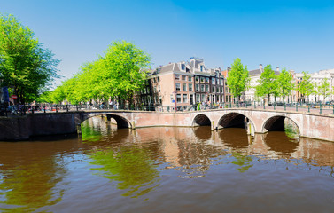 panorama of houses and bridge of Amsterdam over canal ring landmark in old european citye, Holand Netherlands