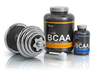 BCAA  branched-chain amino acid with scoop and dumbbell.Bodybuilder nutrition(supplement) concept.