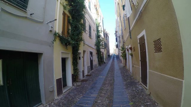 Narrow alley in old town Alghero. Sardinia, Italy