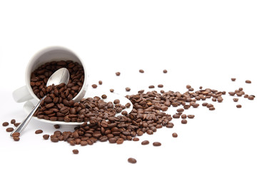 Overturned Coffee Beans and Cup Isolated on White Background with copy space