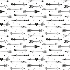 Seamless pattern with hand drawn vintage arrows.