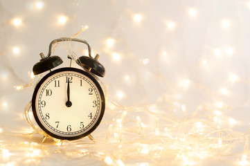 New Year alarm clock. Midnight. Festive Chritmas background