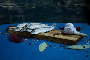 Salted fish on a wooden stand