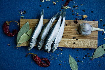 Salted fish on a wooden stand