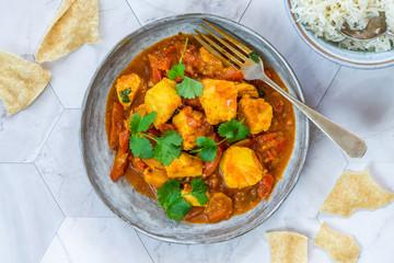 Fish Mappas - Kerala style coconut fish curry with rice. It's a popular dish in southern Indian state of Kerala. Top view