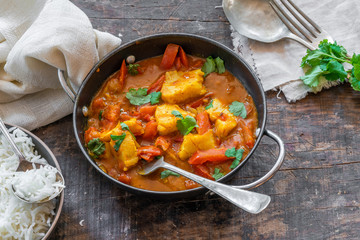 Fish Mappas - Kerala style coconut fish curry with rice. It's a popular dish in southern Indian state of Kerala. High angle view