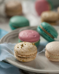 colorful macaroons on wooden table