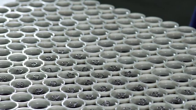 Worker Puts The Springs In Plastic Forms