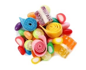 Kussenhoes Pile of delicious colorful chewing candies on white background, top view © New Africa