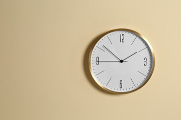 Stylish clock and space for text on color background. Time management
