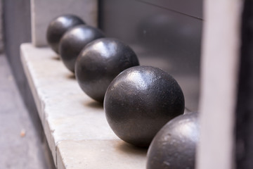 Close Up of Set of Five Iron Cannon Balls