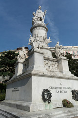Fototapeta na wymiar Statue of Christoforo Colombo in Genova on Blue Sky Background