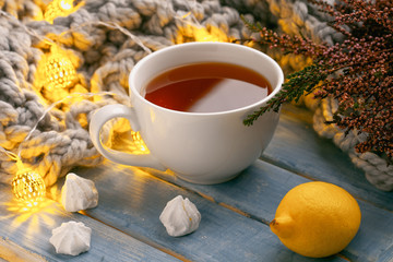 hot tea, meringues, lemons, warm scarf, garland