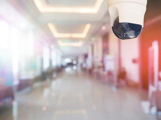 security camera surveillance installed on ceiling to monitor