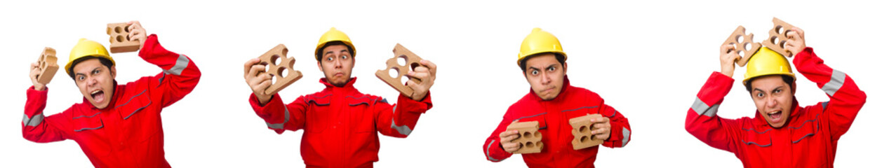 Construction worker with clay bricks on white