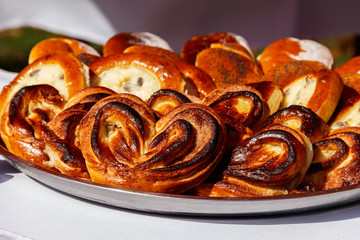 Sweet buns in a tray on the table