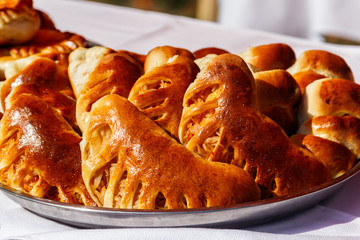 Sweet buns in a tray on the table