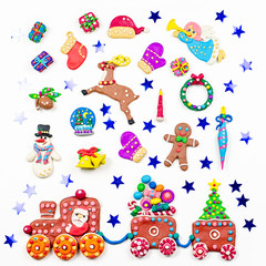 Christmas background with decorations. Santa, Christmas train with tree and sweets, snowman, reindeer and gifts