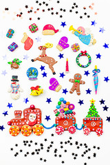Naklejka premium Christmas background with decorations. Santa, Christmas train with tree and sweets, snowman, reindeer and gifts
