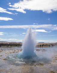 Strokkur geyser beginning to bubble up into an eruption in the golden circle in Iceland