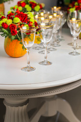 wine glasses on the table for drinks (close-up partial view). Festive crystal