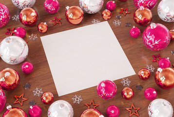 Christmas card mockup with pink baubles 3D rendering