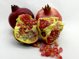 Pomegranate grains on white background