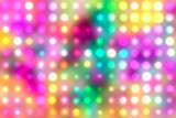 Abstract multicolored kaleidoscope glowing defocused confetti pattern.