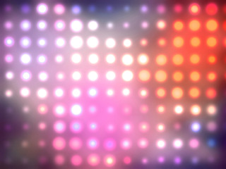 Abstract purple kaleidoscope glowing defocused confetti pattern.