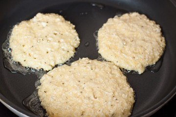 Preparation of paleo cauliflower pizza with ham