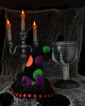 Witch's hat,goblet and candelabra.