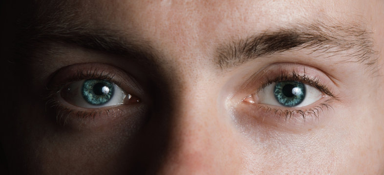 Surreal male green eyes