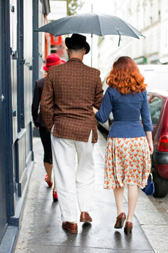 Walking couple in Montmartre streets Paris (France)