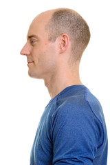 Close up profile view of bald Caucasian man 