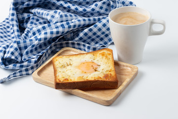 Fried Egg on Toast and cup of Coffee for Breakfast.