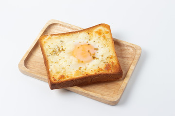 top view of breakfast with fried egg on toast, isolated on white