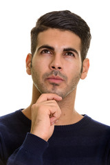 Obraz premium Face of young handsome Persian man thinking