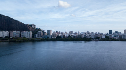 Fototapeta na wymiar aerial view of the drone of the lagoon in rio de janeiro and copacabana, at dusk