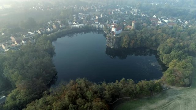Foggy Morning View of a Beautiful Heart Shaped Lake