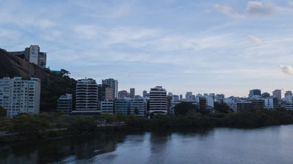 Fototapeta premium aerial view of the drone of the lagoon in rio de janeiro and copacabana, at dusk
