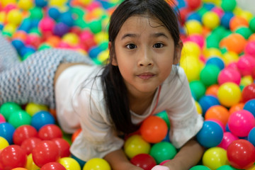 Fototapeta na wymiar Asian child cute girl Play Indoor playground