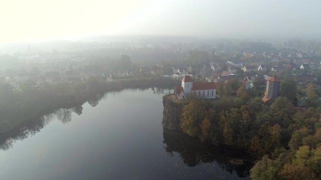 Foggy Morning View of a Beautiful Heart Shaped Lake