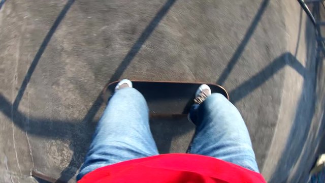 Skateboarder skateboarding at skatepark,slow motion