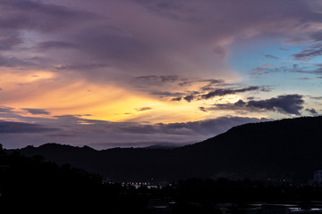 A dramatic sunrise over the city of Patong from the southern hillside.