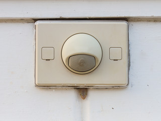 Doorbell on white wall, wall home,