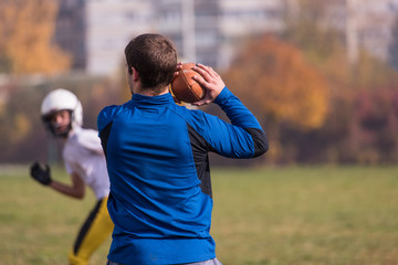 american football team with coach in action