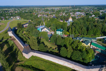 Holy Dormition Pskovo-Pechersky Monastery in the summer landscape (aerial photography). Pechory, Russia