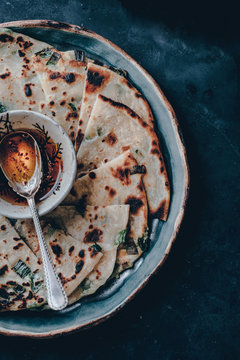 Flatbread and sauce on plate